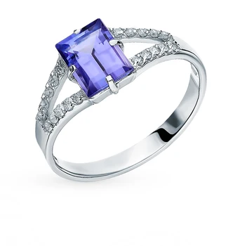 

Gold ring with tanzanite and diamonds sunlight