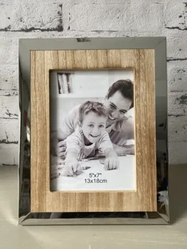 

Natural photo frame wood with metal edge Chrome and in a measure from 13x18