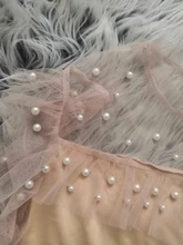 Blusa de manga larga ahuecada con volante elegante para otoño, camisa Sexy de malla transparente con cuentas y cuello redondo para mujer