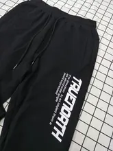 Pantalones de chándal coreanos para hombre, pantalón informal de Hip-Hop, estampado de letras, pantalones de pierna ancha, primavera y otoño, 2021