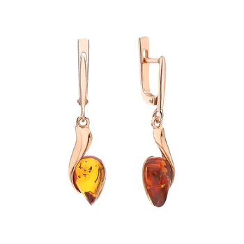 

Silver earrings with amber sunlight
