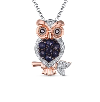 

Gold pendant with black diamonds, sapphires and diamonds sunlight