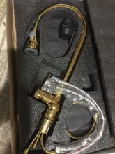 Grifo giratorio de cocina de oro Latón de lujo moderno, grifo extraíble para fregadero, con una sola manija afilada, agua fría y caliente de un solo orificio