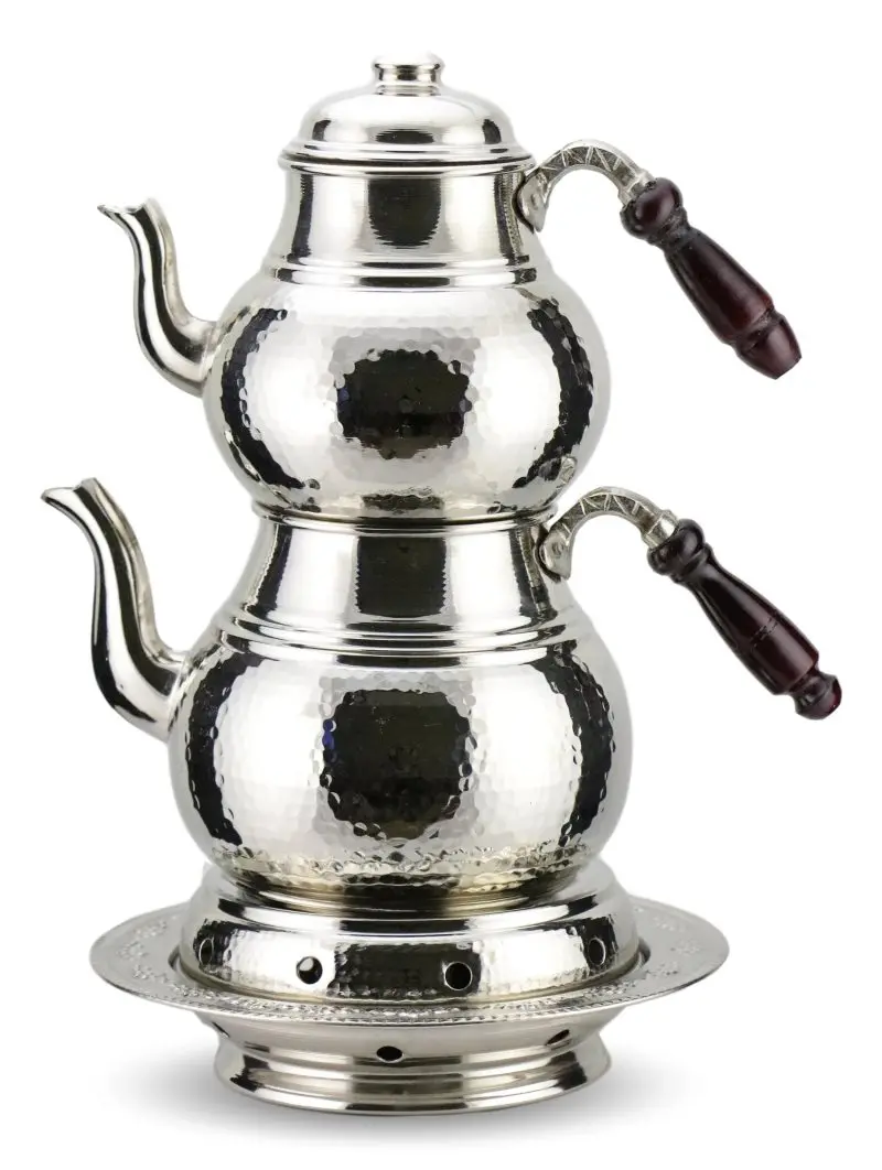 

Chisel Processing Outsize Dollop Of Copper Teapot and Ottoman Quarry