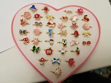 36 anillos de dibujos animados ajustables elegantes fiesta favorece a los niños juguete de figuras de acción para niñas