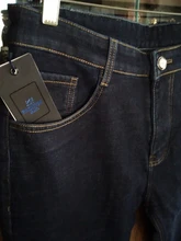 2020 nuevo invierno de los hombres pantalones vaqueros ceñidos de negocios de moda espesar pantalones de mezclilla de estiramiento pantalones de marca Negro Azul