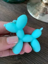 Nuevo creativo de dibujos animados globo de Llavero perro colgante anillo de hombres y mujeres par bolsa de llavero colgante venta al por mayor