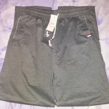 Pantalones de chándal de talla grande tamaño de los hombres pista corredores pantalones de cintura elástica deporte Casual pantalones holgados gimnasio ropa negro gris