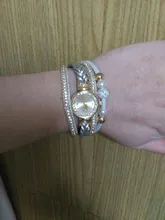 Reloj de pulsera redondo para mujer, hermoso brazalete de moda, creativo y elegante encantador