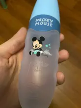 Disney-cuchara para pasta de arroz para bebé, botella de leche de silicona suave, suplemento de alimentos para bebés, artefacto para apretar, cuchara para arroz y fideos