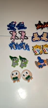 50 unids/lote figura de dibujos animados de PVC zapato encantos para agujeros zapatos bandas hebillas de zapato adornos Bebes Accesorios decoración como La chica regalos de