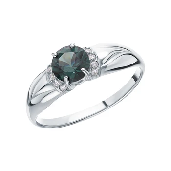 

Silver ring with cubic zirconia and tourmaline imitation sunlight sample 925