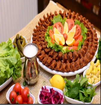 

Raw meatball bulgur with spice Turkish Cig Köfte Delisious Urfa Antep Halal Meatless Etsiz