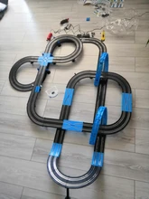 Coche de carreras teledirigido con Control remoto, vehículo eléctrico de carreras de 1:64, con ranura para vía férrea de electrificación, juguete para 4 coches