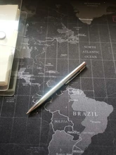 Mini Bolígrafo De Metal duradero, bolígrafo giratorio de bolsillo, portátil, pequeño, de aceite, herramienta de escritura exquisita, 1 Uds.