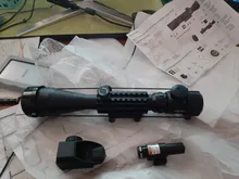 Fire Wolf-Mira iluminada telémetro para caza, rifle de retícula holográfica, visor de 4 retículas, láser rojo de 20 mm, ideal cacería, 4-12x50