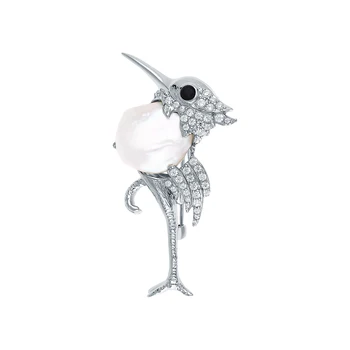 

Silver brooch with pearls, spinels synthetic and cubic zirconia sunlight sample 925