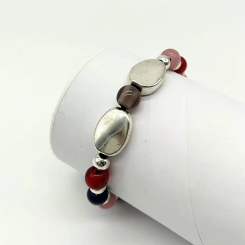 

Bracelet for women with colorful beads mixed with silver trim.