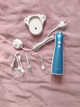 Irrigador Oral portátil, recargable, hilo dental limpio, chorro de agua, irrigador de carga inductiva, exquisito