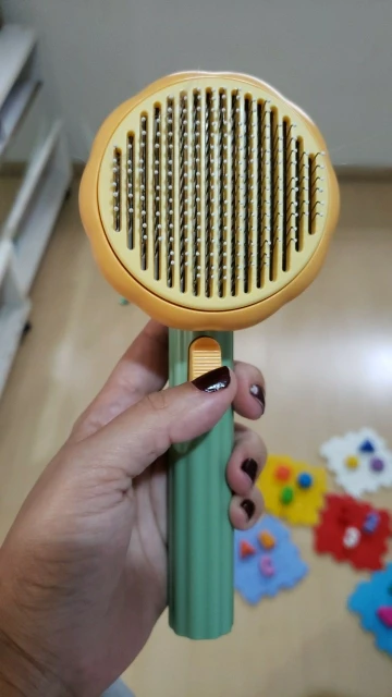 Pumpkin Style Self Cleaning Slicker Brush For Pets photo review