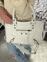 Bolso europeo de cuero PU para motocicleta para mujer, bandoleras cruzadas con remaches y borlas