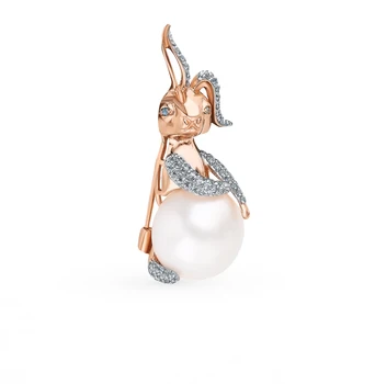 

Gold brooch with cubic zirconia and pearls sunlight sample 585