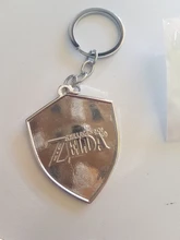 Unisex llavero escudo Hylian/Sheikah pizarra clave colgante cadenas Anime baratija llavero colecciones clave anillo