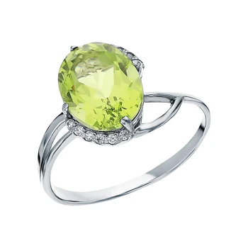 

Silver ring with cubic zirconia and хризолитами synthetic sunlight sample 925 test