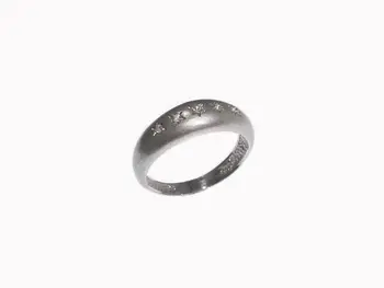 

Five Diamond Ring in white gold with stars.