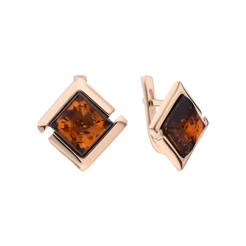 

Silver earrings with amber sunlight