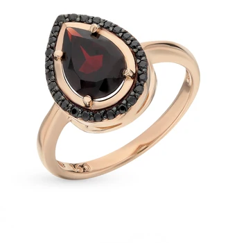 

Gold ring with cubic zirconia and Garnet sunlight sample 585 test