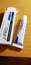 Crema de tubo de J-PRO para tatuaje, Piercing indoloro, maquillaje permanente, delineador de cejas y labios Analgésico 10g, 39%