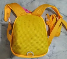 Mochila de grado alto para bebés y niñas, morral escolar 3D antipérdida con dibujos animados para guardería, impermeable de dinosaurios