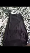 Vestido ajustado de fiesta con espalda al aire, vestido de mujer que estiliza la figura, corto, con tirantes muy finos y escote abierto