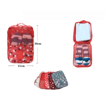 

Organizador de artículos de baño para viaje. Con rejilla para chanclas y bolsillo para la toalla.