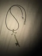 Anime ataque en collar de titanio Eren clave Shingeki No colgante de Kyojin alas de la libertad de Metal de cuero Unisex collar de cadena Cosplay