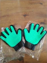 Nuevo cepillo para mascotas guante peine aseo de gatos muda de piel de la mascota de guantes peine en forma de mano guante de limpieza de mascota peine para perros y gatos