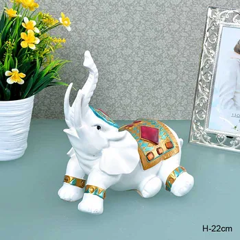 

Figurine elephant resting 22 cm