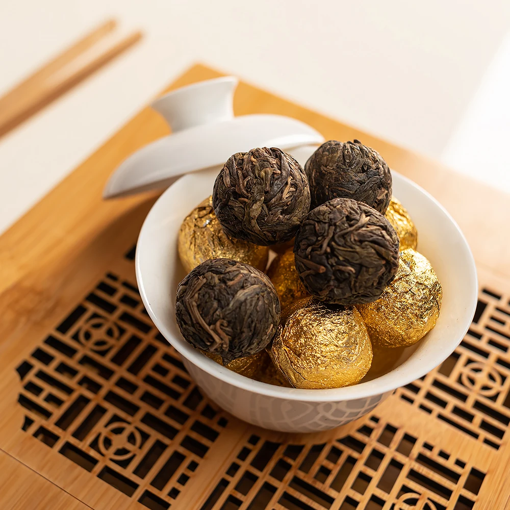 Sheng Puer Bang Dong Gu Shu tea, 2018, 7-9 gram balls. Puer, Puer tea, Sheng Puer, Sheng Puer tea, Shen Puer, Shen Puer top grade, Shen Puer tea 357g, Shen Puer tea Shen Puer 20 years old Shen Puer locket Puer pressed