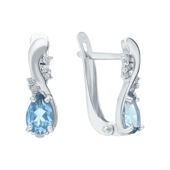 

Silver earrings with Topaz and cubic zirconia sunlight sample 925 test