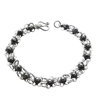 

Law silver bracelet 925m flowers intertwined rusty 18cm. Hook closure
