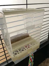 Tamaño pequeño pájaro aves de corral Alimentador automático contenedor de alimentos acrílicos paloma loro a prueba de salpicaduras 10x12x7.5CM