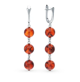

Silver earrings with amber sunlight