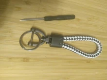 LLavero de cuero tejido a mano de alta calidad para coche, hebilla de herradura giratoria de 360 grados, joyería Soporte para Llaveros colgante de bolsa auténtica