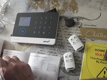 Inalámbrico Tuya APP SIM GSM casa RFID de seguridad antirrobo LCD teclado táctil sistema de alarma WIFI/GSM kit de Sensor ruso español voz