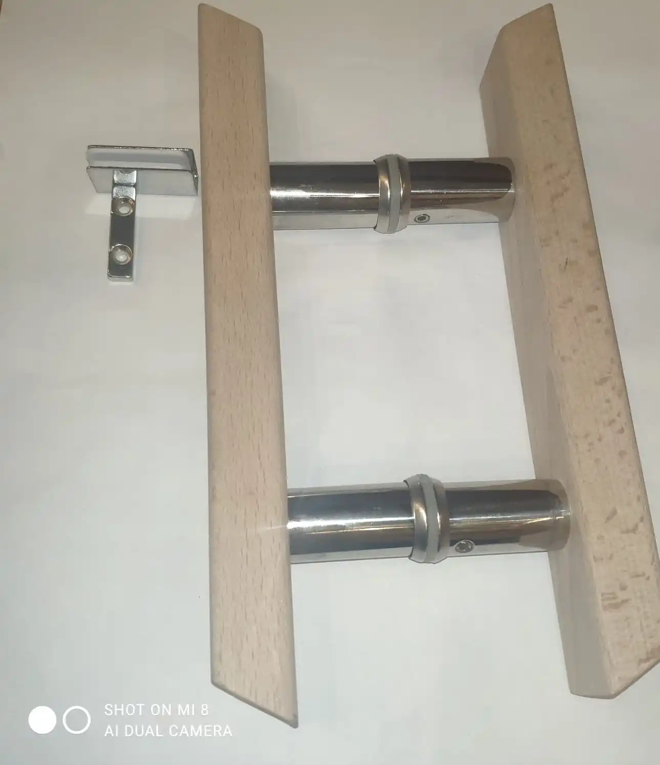 Wooden handle for glass door to sauna |