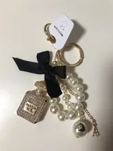 2020 nuevo de imitación de la perla botella de Perfume con llavero coche Soporte para Llavero bolsa encanto colgante accesorios arco clave Cadena de llavero