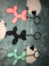 Nuevo creativo de dibujos animados globo de Llavero perro colgante anillo de hombres y mujeres par bolsa de llavero colgante venta al por mayor