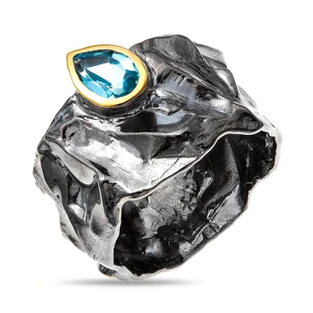 

Silver ring with Topaz Swiss