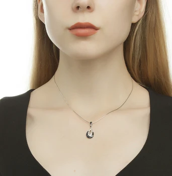 

Gold pendant with diamonds sunlight